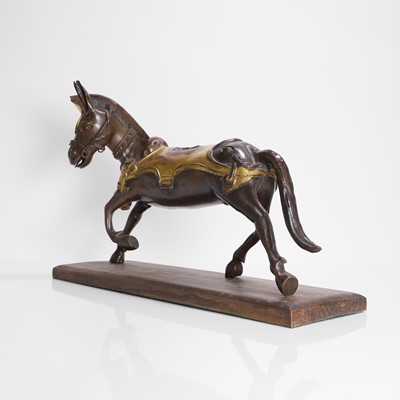 Lot 147 - A Tibetan parcel-gilt bronze model