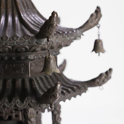 Lot 146 - A Tibetan bronze pagoda