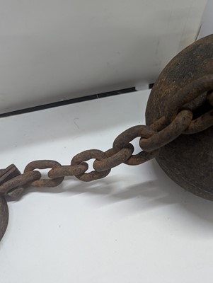Lot 364 - A cast iron ball and chain