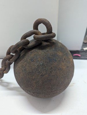 Lot 364 - A cast iron ball and chain