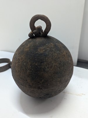 Lot 364 - A cast iron ball and chain