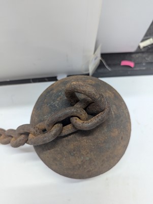Lot 364 - A cast iron ball and chain