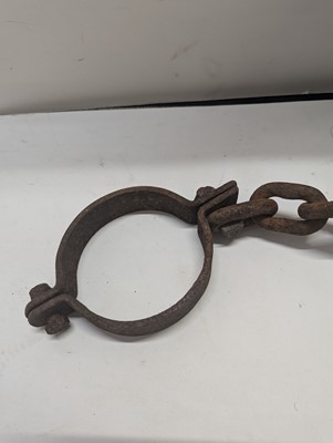 Lot 364 - A cast iron ball and chain