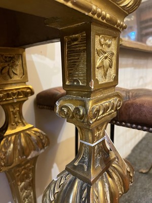 Lot 21 - A pair of Louis XIV-style giltwood console tables