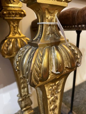 Lot 21 - A pair of Louis XIV-style giltwood console tables