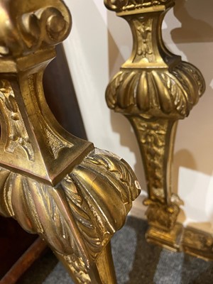 Lot 21 - A pair of Louis XIV-style giltwood console tables