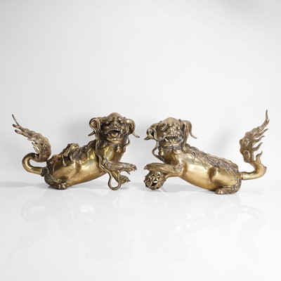 Lot 93 - A pair of Chinese gilt-bronze Buddhist lions