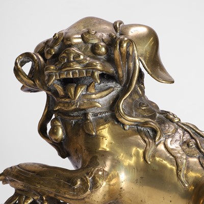 Lot 93 - A pair of Chinese gilt-bronze Buddhist lions