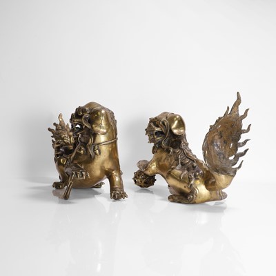 Lot 93 - A pair of Chinese gilt-bronze Buddhist lions