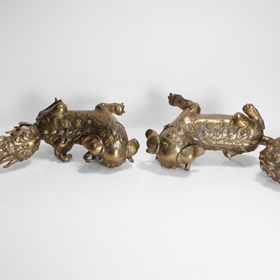 Lot 93 - A pair of Chinese gilt-bronze Buddhist lions