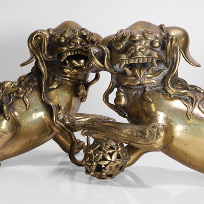 Lot 93 - A pair of Chinese gilt-bronze Buddhist lions