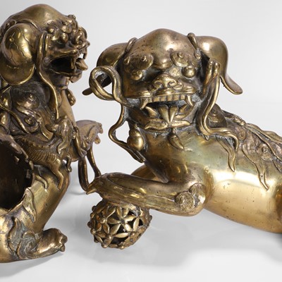 Lot 93 - A pair of Chinese gilt-bronze Buddhist lions