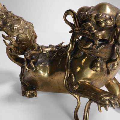 Lot 93 - A pair of Chinese gilt-bronze Buddhist lions