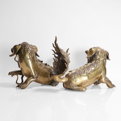 Lot 93 - A pair of Chinese gilt-bronze Buddhist lions