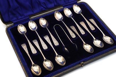 Lot 35 - A cased set of silver teaspoons and sugar tongs