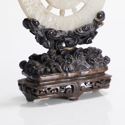 Lot 134 - A Chinese jade bi disc