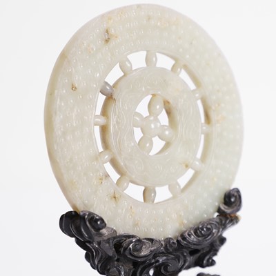 Lot 134 - A Chinese jade bi disc