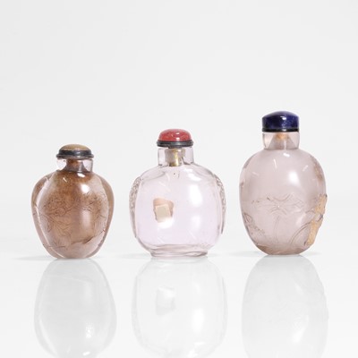 Lot 176 - A collection of three Chinese rock crystal snuff bottles