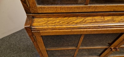 Lot 120 - A Heal's oak glazed bookcase