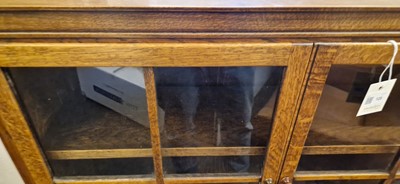 Lot 120 - A Heal's oak glazed bookcase