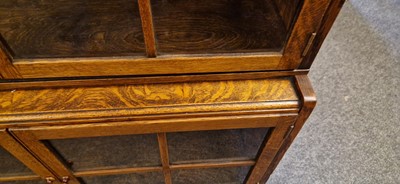 Lot 120 - A Heal's oak glazed bookcase