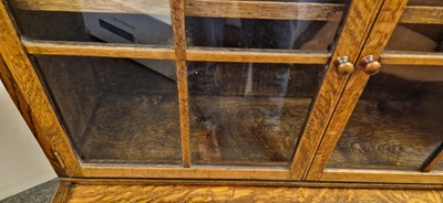Lot 120 - A Heal's oak glazed bookcase