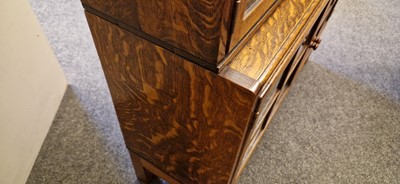 Lot 120 - A Heal's oak glazed bookcase