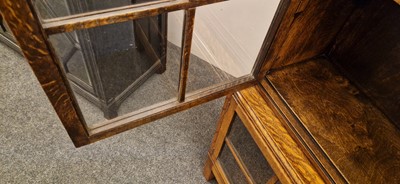 Lot 120 - A Heal's oak glazed bookcase