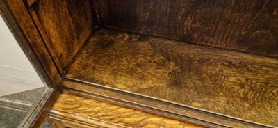 Lot 120 - A Heal's oak glazed bookcase