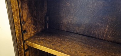 Lot 120 - A Heal's oak glazed bookcase