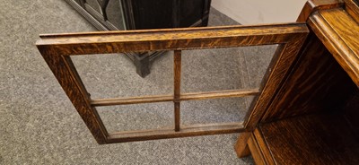 Lot 120 - A Heal's oak glazed bookcase
