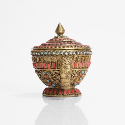 Lot 231 - A Nepalese gilt-metal filigree and stone-inset votive plaque