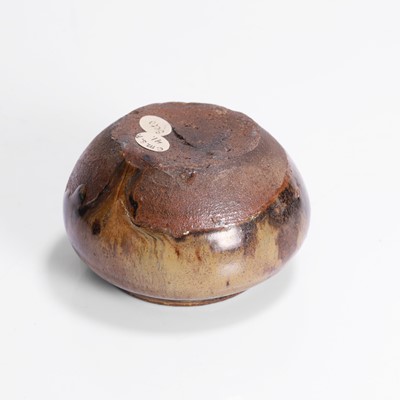 Lot 247 - A Japanese earthenware jarlet