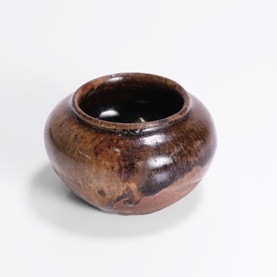 Lot 247 - A Japanese earthenware jarlet