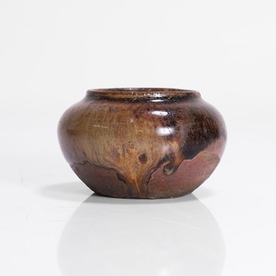 Lot 247 - A Japanese earthenware jarlet