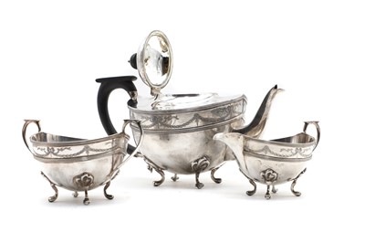 Lot 57 - A silver three piece tea service