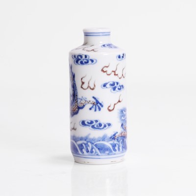 Lot 165 - A Chinese copper-red and underglaze blue snuff bottle
