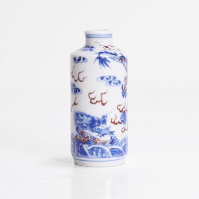 Lot 165 - A Chinese copper-red and underglaze blue snuff bottle