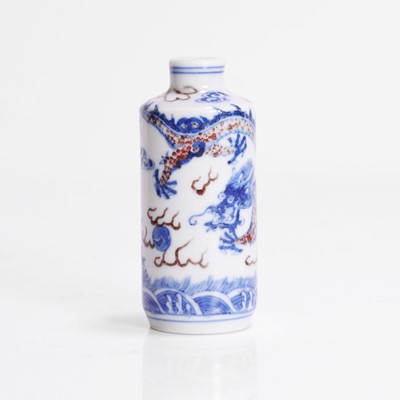 Lot 165 - A Chinese copper-red and underglaze blue snuff bottle