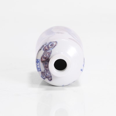 Lot 167 - A Chinese copper-red and underglaze blue snuff bottle