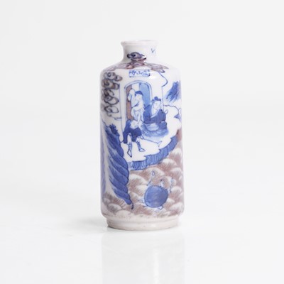 Lot 167 - A Chinese copper-red and underglaze blue snuff bottle