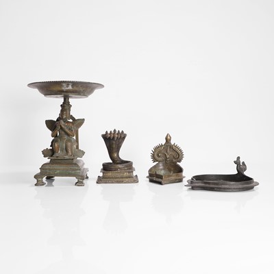Lot 218 - An Indian bronze Garuda lamp stand