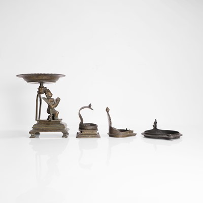 Lot 218 - An Indian bronze Garuda lamp stand