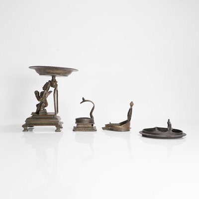 Lot 218 - An Indian bronze Garuda lamp stand
