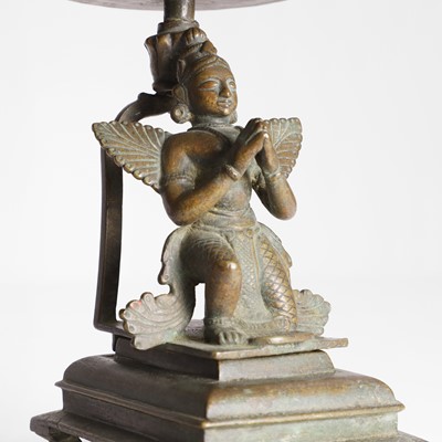 Lot 218 - An Indian bronze Garuda lamp stand