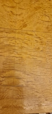 Lot 78 - An Art Deco burr maple dining suite