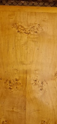 Lot 78 - An Art Deco burr maple dining suite