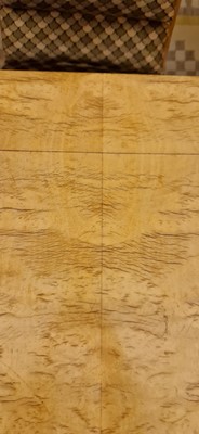 Lot 78 - An Art Deco burr maple dining suite