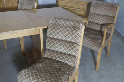 Lot 78 - An Art Deco burr maple dining suite