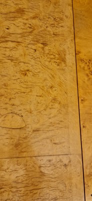 Lot 78 - An Art Deco burr maple dining suite